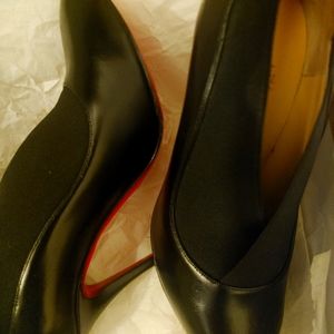 Christian Loubiutin signature shoes